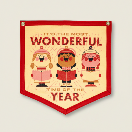 Decorative banner with cartoon characters and text 'It's the most wonderful time of the year' on a white background.